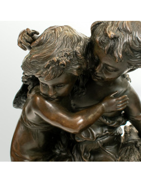Bronze statue of two children carrying a bouquet of flowers, signed Auguste Moreau